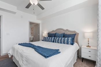 Bright bedroom with ceiling fan
